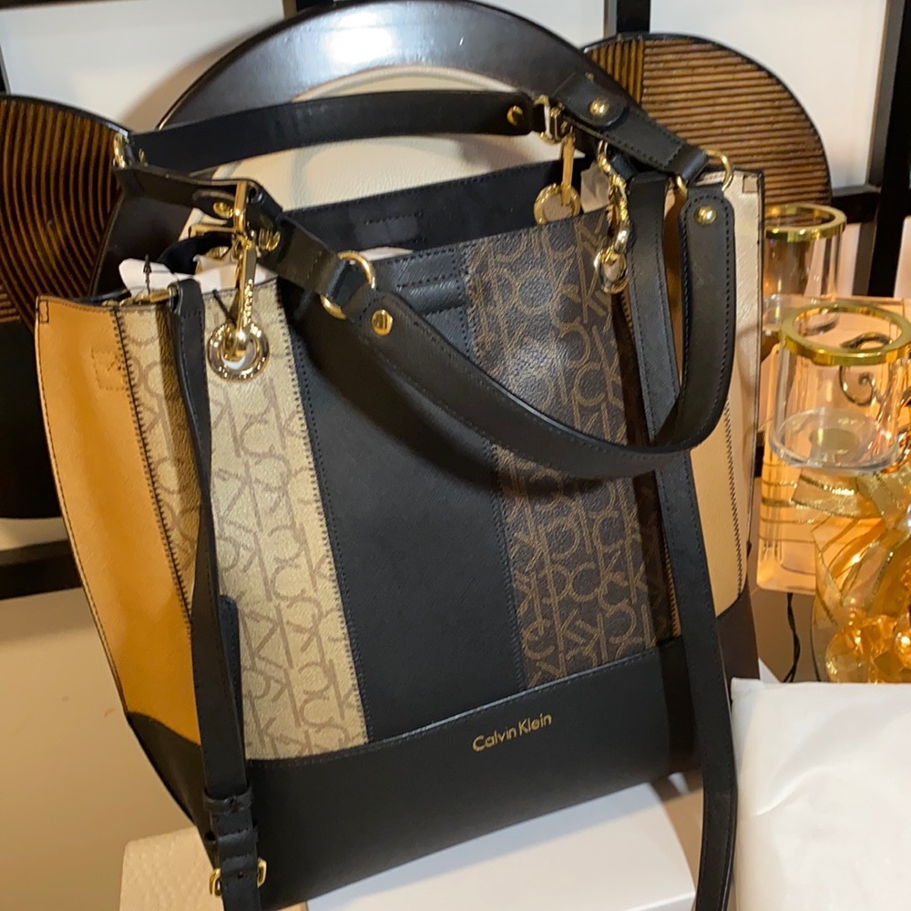 Beautiful Calvin Klein brand new with dust bag.